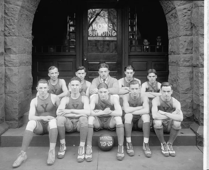 A YMCA basketball team photographed in 1920